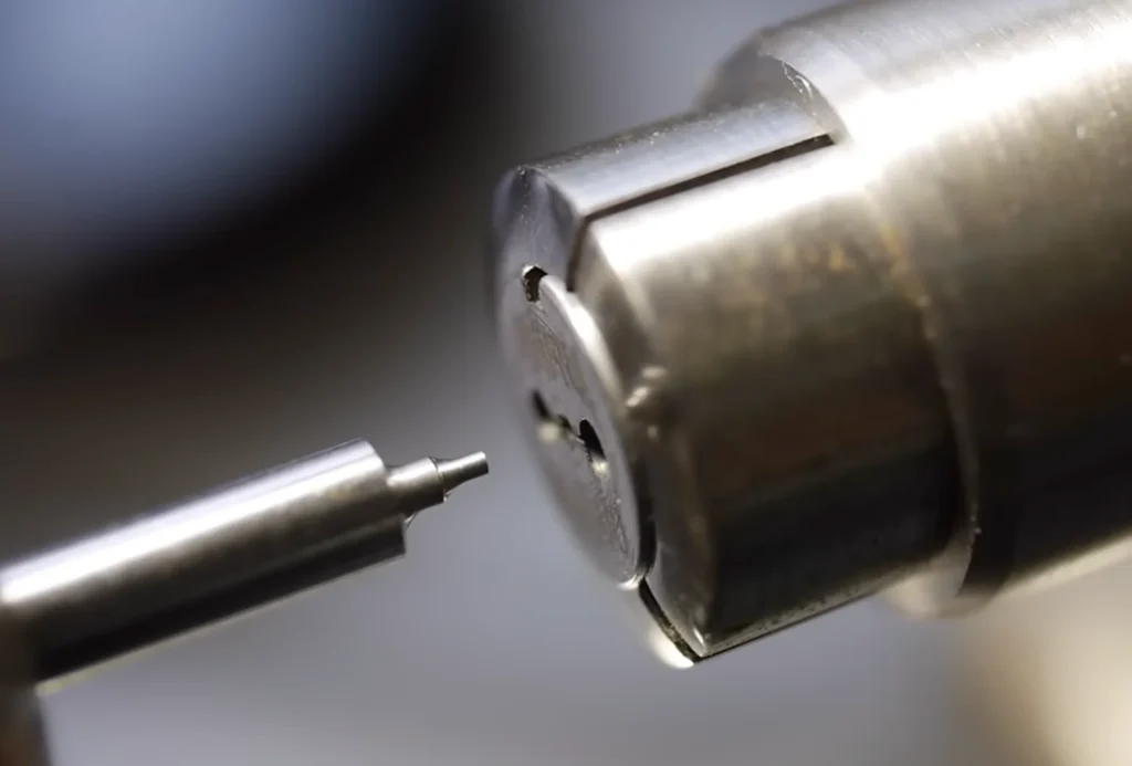 Preparing to machine threads on watch components