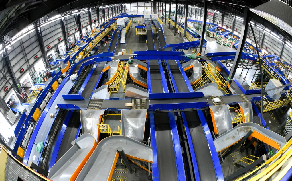 Warehouse automation with AGVs and robotic picking systems